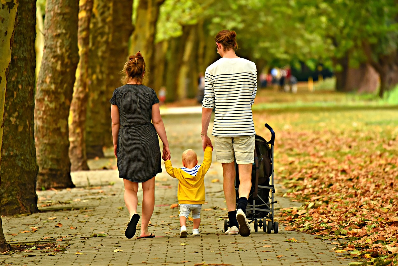 A family walking in the park.